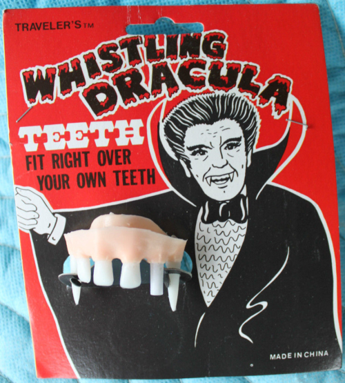 Whistling dracula teeth for halloween