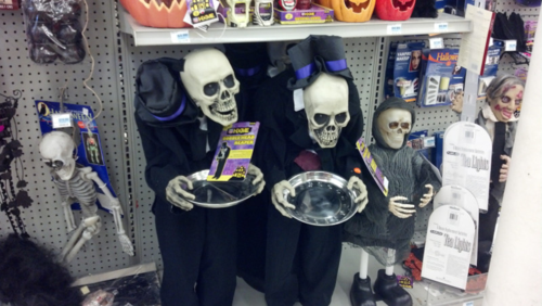 Halloween candy holding skeletons
