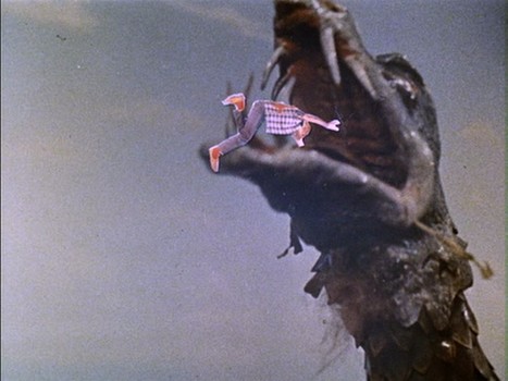 Reptilicus special effect of man being eaten by giant dragon. Reptilicus special effect of man being eaten by giant dragon.