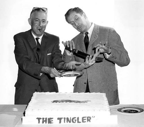 William Castle offers to lend Vincent Price a hand in cutting The Tingler cake. William Castle offers to lend Vincent Price a hand in cutting The Tingler cake.