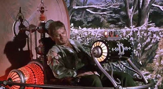 A great blue-screen composite shot of Rod Taylor and the machine on the way back to the year 1900. The background is an animated painting by Bill Brace showing the changing of the seasons. Watch carefully: the seasons are changing backwards – winter, fall, summer, spring, winter, fall, summer, spring, etc.! A great blue-screen composite shot of Rod Taylor and the machine on the way back to the year 1900. The background is an animated painting by Bill Brace showing the changing of the seasons. Watch carefully: the seasons are changing backwards – winter, fall, summer, spring, winter, fall, summer, spring, etc.!