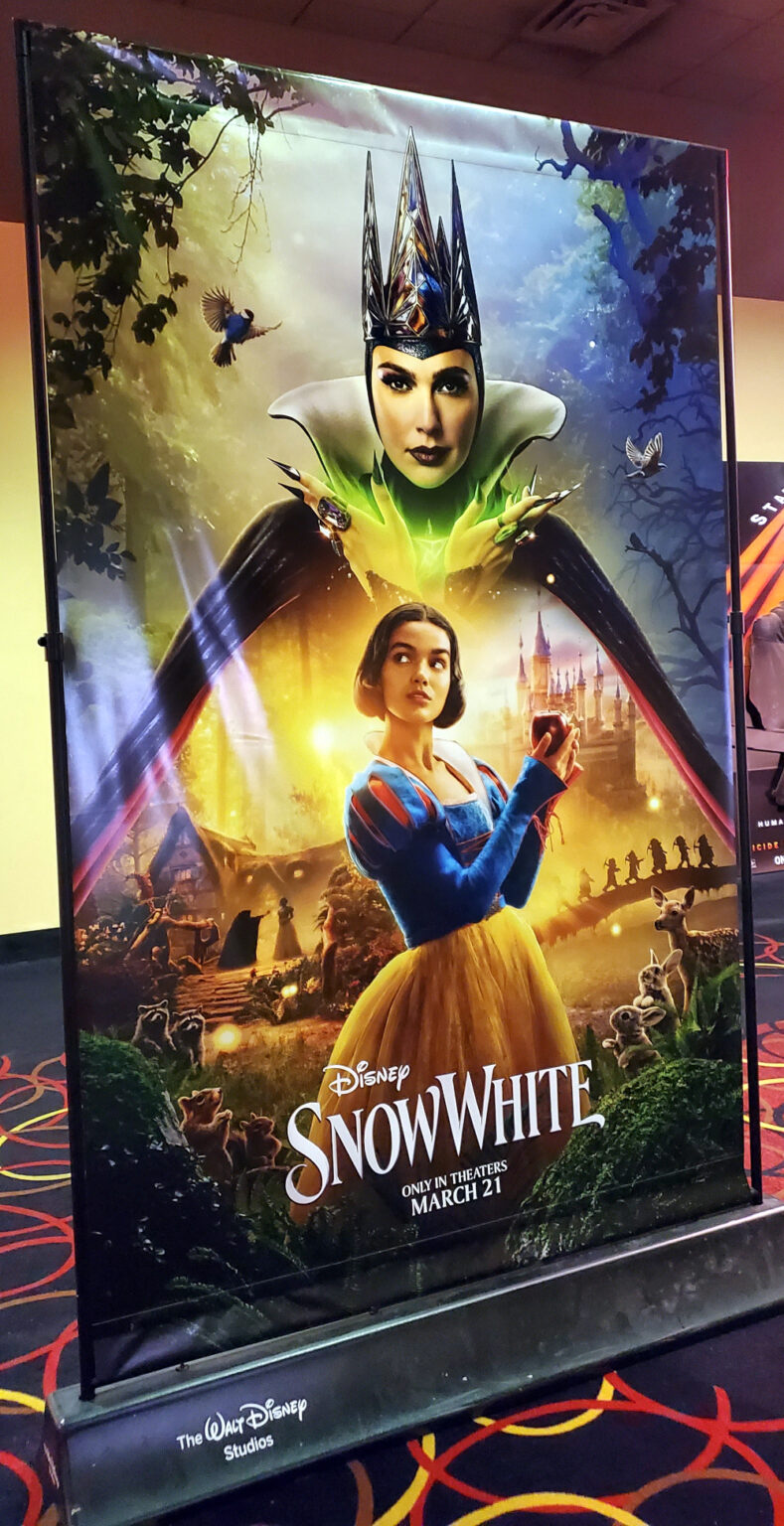 Snow White movie poster standee showing wicked queen and snow white