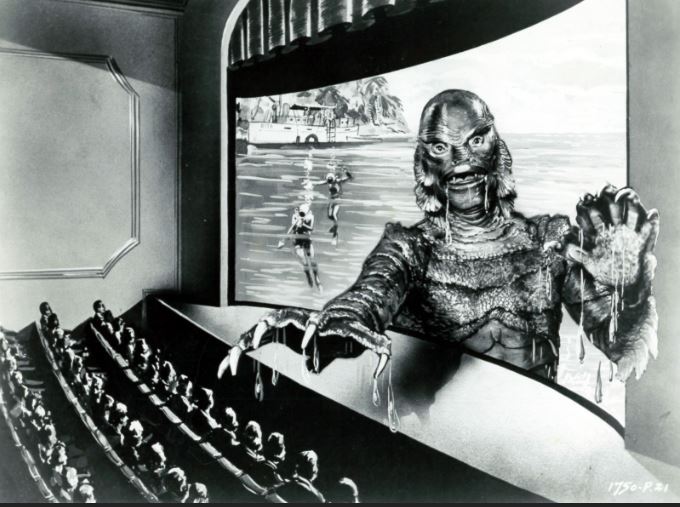 One of a series of publicity stills created to demonstrate how the 3D effect would appear to theater audiences. A similar set was produced for It Came From Outer Space. One of a series of publicity stills created to demonstrate how the 3D effect would appear to theater audiences. A similar set was produced for It Came From Outer Space. This one shows the Creature's arm extending out of the theater screen.