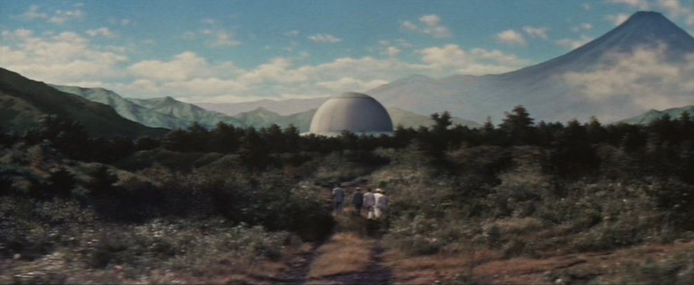 They are not following the yellow brick road, but the scientists are accepting an invitation to visit the Mysterians’ dome base. A nice split screen composite shot. They are not following the yellow brick road, but the scientists are accepting an invitation to visit the Mysterians’ dome base. A nice split screen composite shot. The Mysterians 1957
