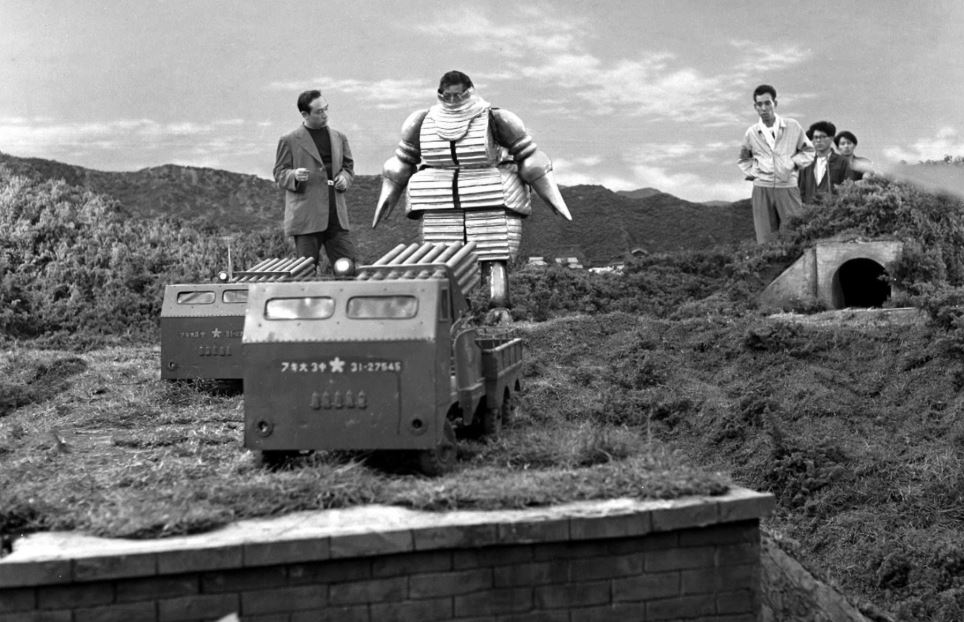 Haruo Nakajima goes over the setup for the upcoming pyrotechnic scene. Nakajima and Katsumi Tezuka each donned the metallic costume which looks very uncomfortable! Setting up the scene in The Mysterians 1957.