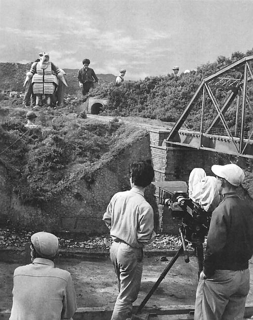 Getting ready to shoot the bridge scene. Lots of practical effects need to be coordinated to go off as planned. The Mysterians 1957 Getting ready to shoot the bridge scene. Lots of practical effects need to be coordinated to go off as planned. The Mysterians 1957