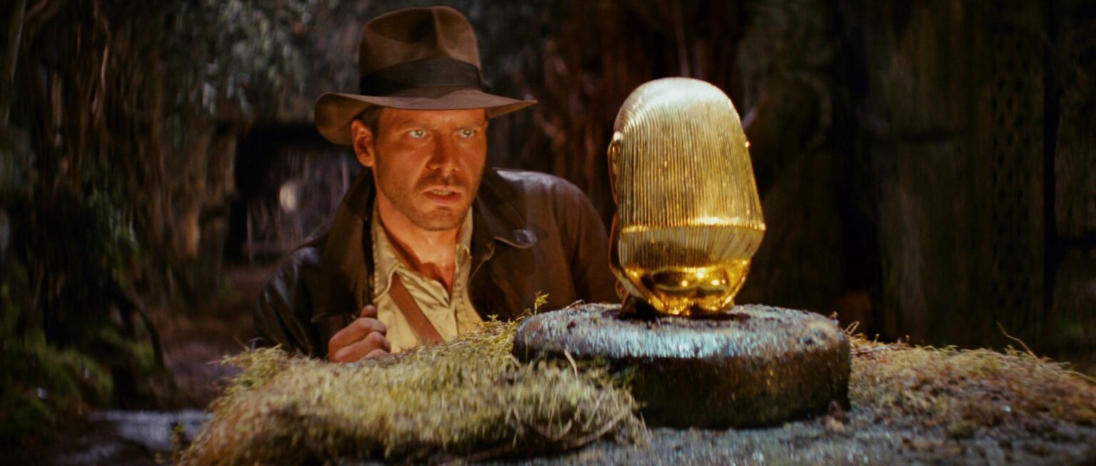 Indiana Jones and the Raiders of the Lost Ark scene with Indie looking at golden idol Indiana Jones and the Raiders of the Lost Ark scene with Indie looking at golden idol